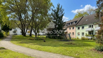 begrünter Innenhof - Attraktive Kapitalanlage im Berliner Westend – vermietete 2,5-Zimmer-Wohnung mit Balkon